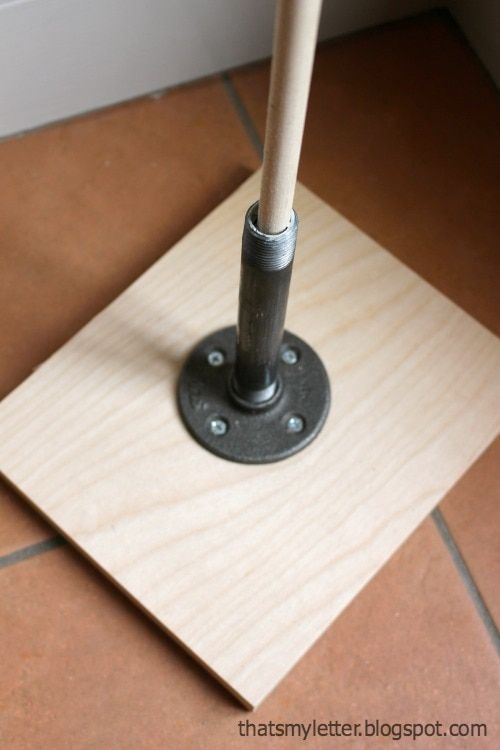 a wooden floor with an umbrella on it