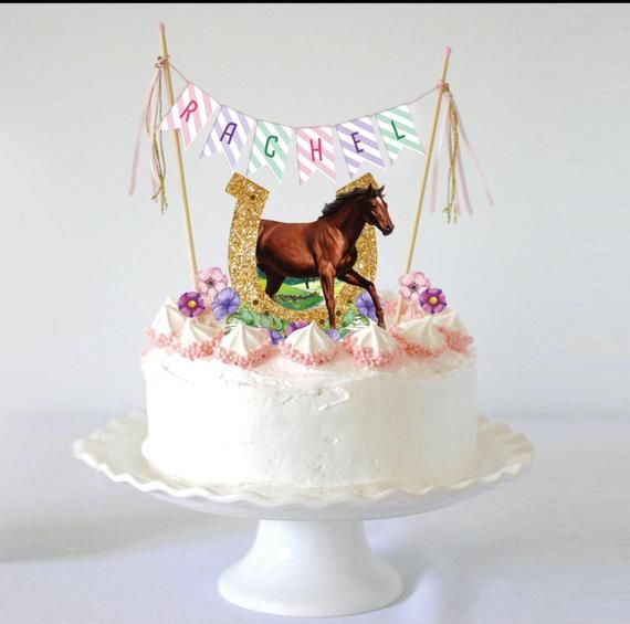 a birthday cake with a horse on top