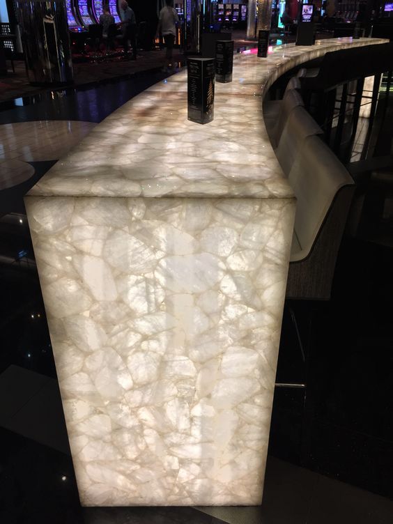 a white marble counter top in a restaurant