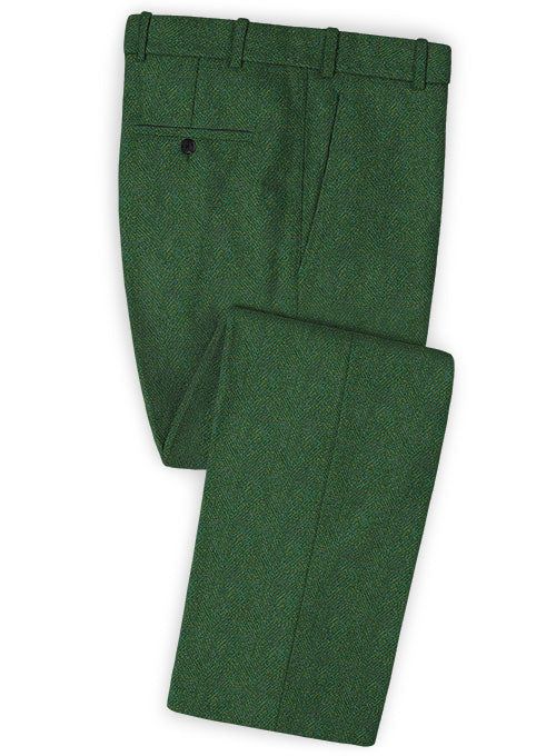 Flaunt your elegant dressing sense with great zeal by simply donning our Harris Tweed Wide Herringbone Royal Green pants. Crafted from 100% wool, the pants add a touch of class to your wardrobe and you will definitely be the recipient of compliments all day long, thanks to the rich fresh hue and the herringbone weave on the outfit. Team it with a matching waistcoat and jacket, white shirt, brown tie and black derby shoes for a sophisticated finish. 
 
 Look Includes  Harris Tweed Wide Herringbon Elegant Dressing, Fabric Cross, Dressing Sense, Royal Green, Brown Tie, Green Suit, Green Pants, Harris Tweed, Derby Shoes