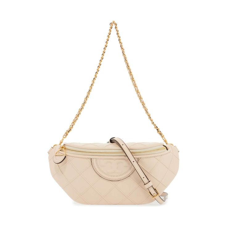 The Tory Burch Fleming Belt Bag is made of soft leather with trapezoid pleats and embellished with a double T logo. It features a zip closure and a lined interior, as well as an additional back slip pocket. The removable chain strap can be interchanged to wear the bag crossbody, around the waist, or on the shoulder. The metallic hardware has a gold finish for a luxurious touch. Tory Burch Belt Bag, T Logo, Leather Belt Bag, Tory Burch Bag, Diamond Quilt, Quilted Leather, Beauty Accessories, Pink Bag, Chain Strap