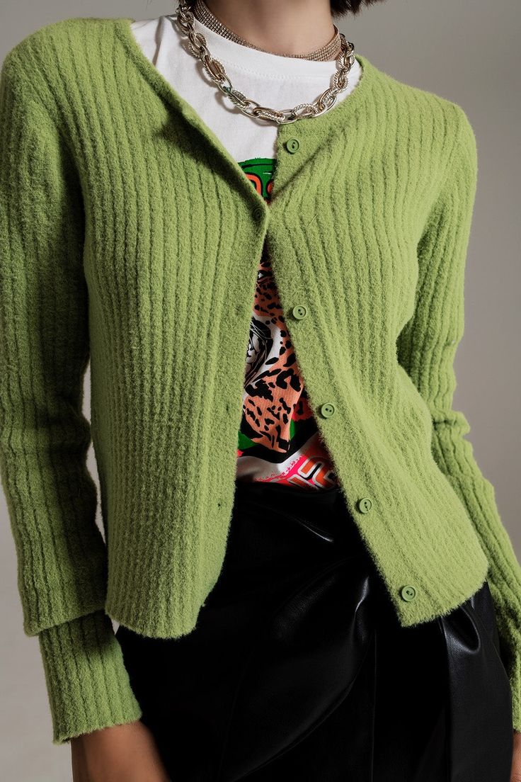 Wrap yourself in comfort and style with our Green Super Soft Fluffy Knit Cardigan. This cardigan features a luxurious and soft fluffy knit design, perfect for staying warm and fashionable. Crafted from 100% polyamide, it offers a cozy and lightweight feel. With a bodycon fit and 3/4 length sleeves, it provides a trendy and flattering silhouette. The button placket adds a touch of elegance and functionality to the cardigan. Whether for a party or a casual outing, this green fluffy knit cardigan e Green Winter Outfits, Green Cardigan Outfit, Cardigan Sleeves, Small Cardigan, Soft Knit Cardigan, Fluffy Knit, Cardigan Green, Chic Skirts, Short Cardigan