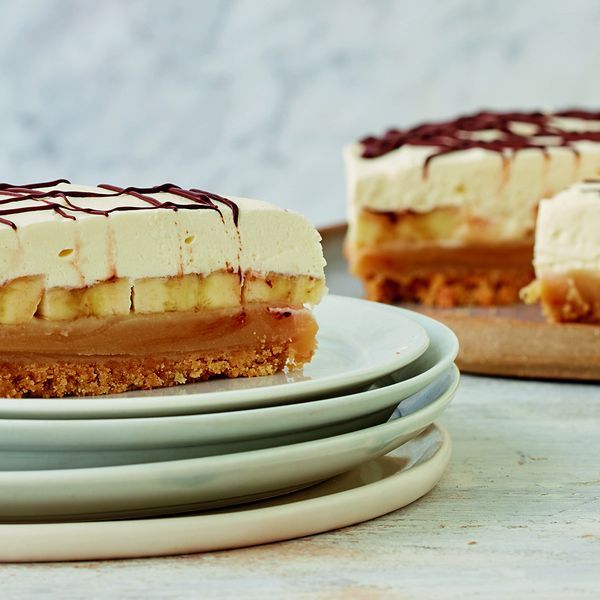 there is a piece of cake on the plate and two plates with one slice missing