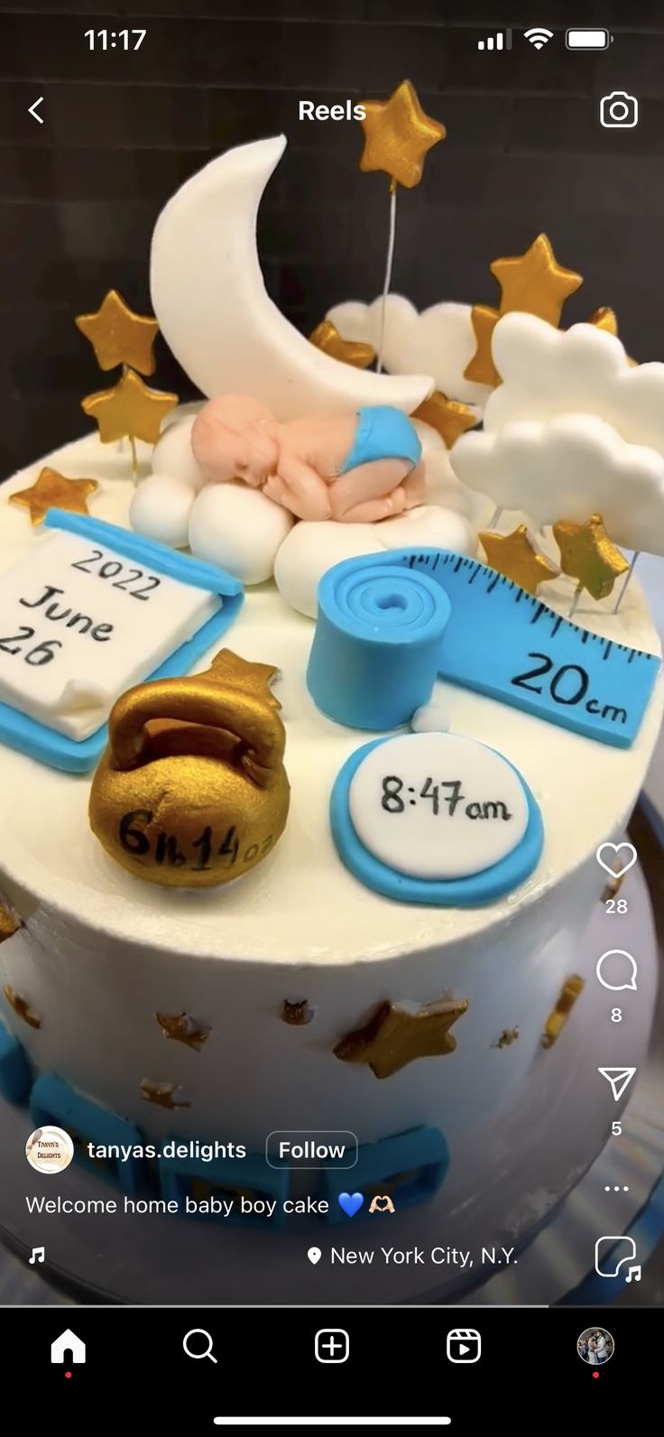 a baby's birth cake is decorated with stars and moon