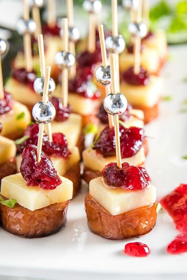 small appetizers with cranberry sauce and toothpicks