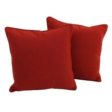 two red pillows sitting next to each other