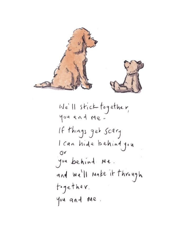 two dogs sitting next to each other in front of a poem