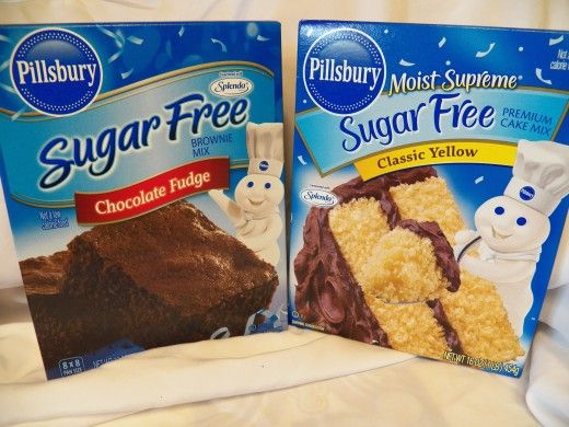 two packages of sugar free chocolate fudge and frosted cake