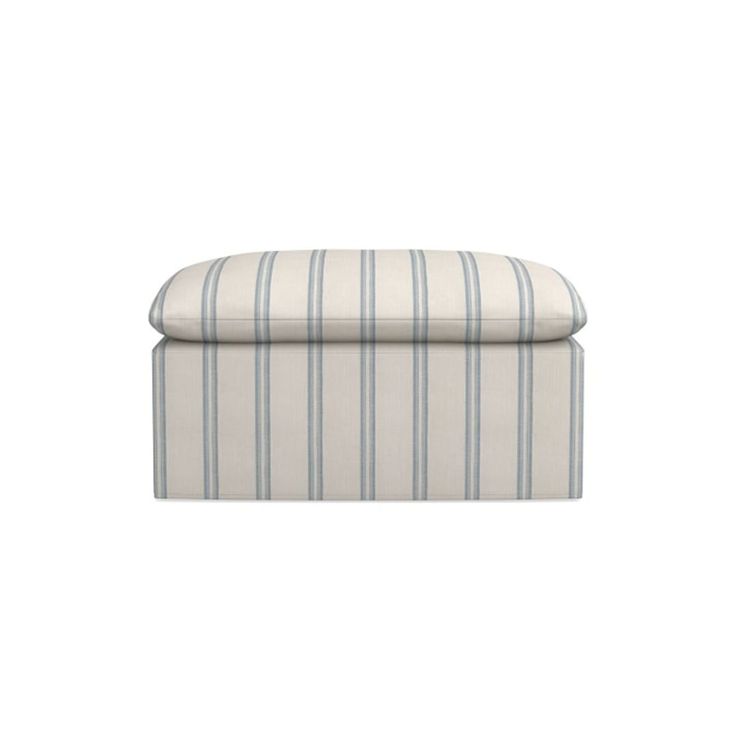 a white and blue striped footstool on a white background with no people around it