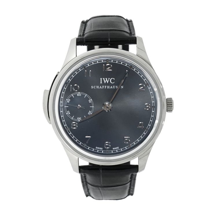 Pre-owned in excellent condition IWC Portugieser Minute Repeater, 43mm White Gold case, Manual Wound movement caliber 98950, 46 hours of power reserve, Grey dial with small seconds at 9 o’clock, applied white gold Arabic Numeral hour markers, polish white gold hands, Minute Repeater lever between 8 and 10 o’clock, scratch resistant sapphire crystal, black leather strap with deployant buckle, limited edition of 250 pieces. This watch is complete with original IWC box and warranty papers. The refe Vintage Timepiece, House Gifts, Fine Watches, Gold Hands, Gold Price, Gold Case, Watches Jewelry, Jewelry Creation, Samsung Gear Watch