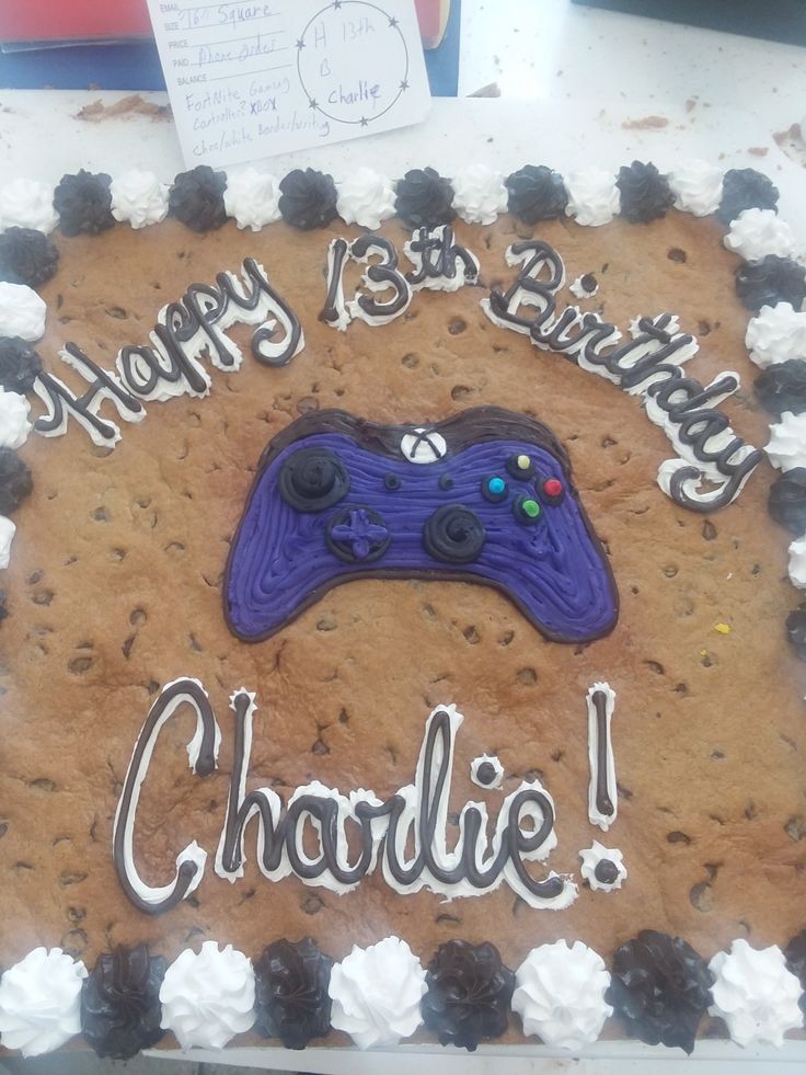 a birthday cake with a video game controller on it