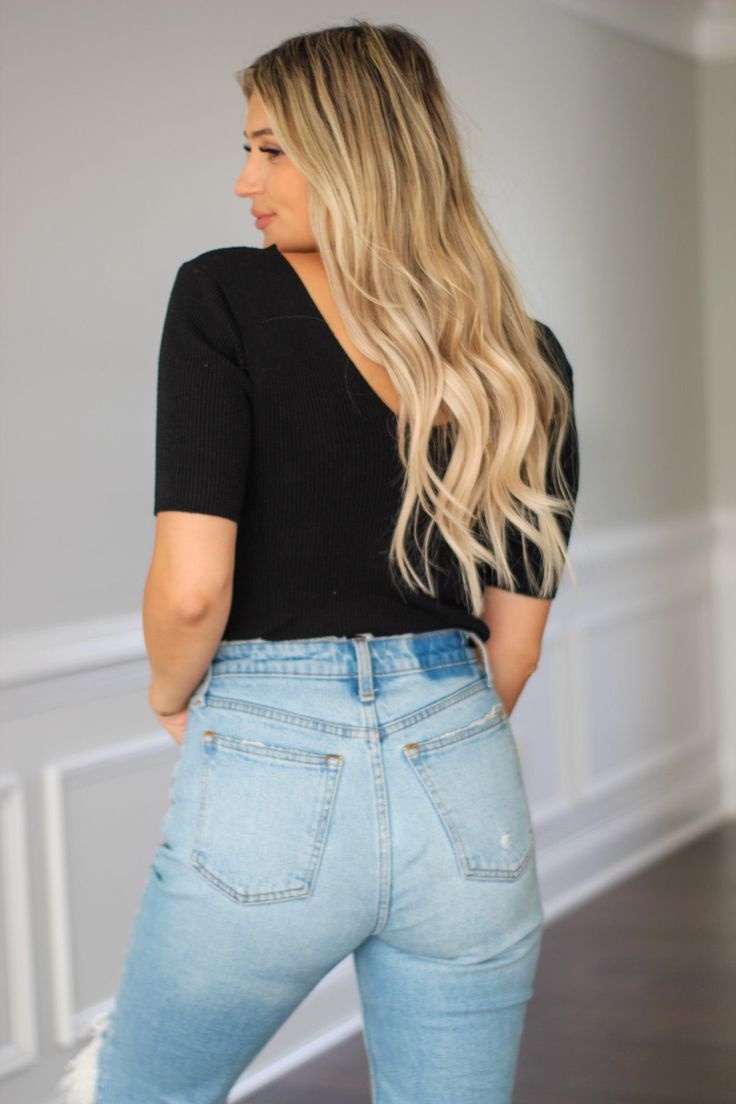 We are loving this bodysuit styled in so many ways for spring and summer! It is so easy to wear mixed and matched with different bottoms. Pair it with a fun skirt for a more dressed up look or denim shorts for a cute and casual vibe. Either way, you'll love the way this bodysuit feels! Details: V-Neck Button Down Ribbed Bodysuit Sizing: Model is wearing size SMALL MODEL SPECS HEIGHT: 5'4" WAIST: 27" HIPS: 37" Summer V-neck Bodysuit For Night Out, Casual V-neck Bodysuit For Spring, Chic V-neck Bodysuit For Day Out, Flirty Black Bodysuit For Summer, Chic High Waist Bodysuit For Spring, Spring Date Night High-waist Bodysuit, High Waist Bodysuit For Night Out In Spring, Trendy Short Length Top For Night Out, Short Length Tops For Date Night In Summer