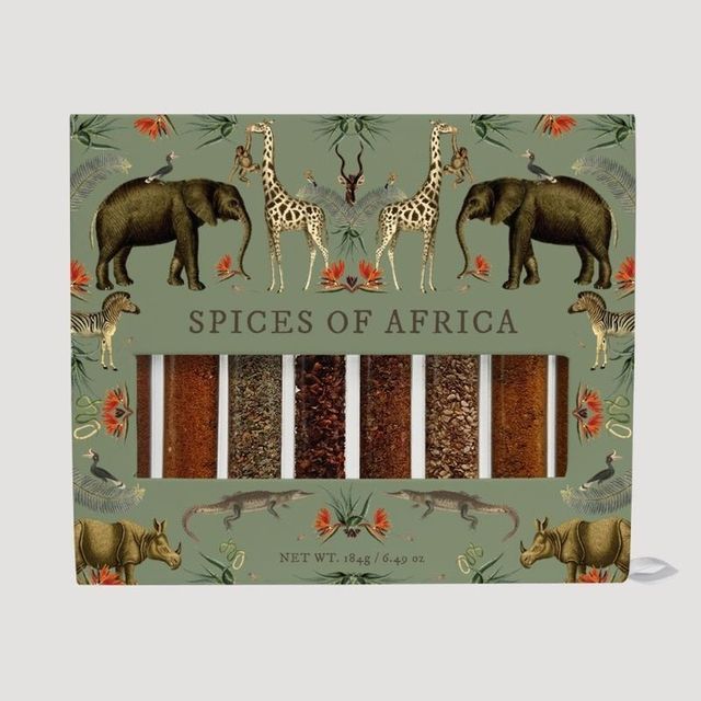 three different types of spices in front of a green background with an elephant and giraffe