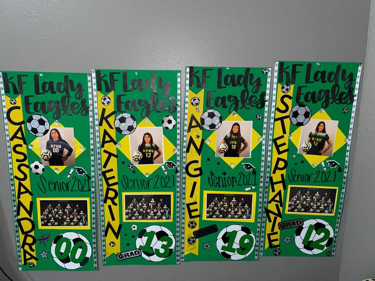 three green and yellow flyers with pictures of women's soccer players on them hanging from a wall