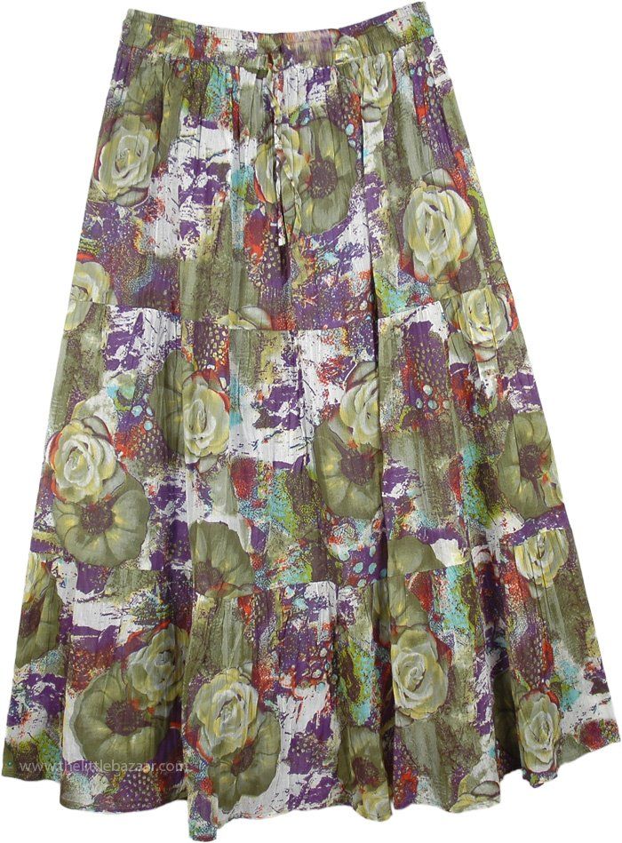 Green Purple Deep Floral Cotton Skirt - A calm and peaceful floral print on this swingy, swirly cotton skirt is utter bliss in the warm summer months. Fads and trends may come and go but flowers bloom in all the seasons, flowers can never go out of fashion. This midi length floral print skirt puts you in a tropical rain forest in full bloom and combines comfort and style in one. Pair this cotton printed skirt with a solid top and some patent heels for a fun summer day on the beach. Romantic and Spring Cotton Skirt With Floral Patchwork, Green Flared Skirt With Floral Print, Green Flared Maxi Skirt With Floral Print, Spring Floral Patchwork Maxi Skirt, Bohemian Floral Print Maxi Skirt For Spring, Casual Floral Patchwork Skirt For Summer, Multicolor Floral Print Skirt For Garden Party, Hippie Floral Print Flowy Skirt, Hippie Floral Print Tiered Skirt