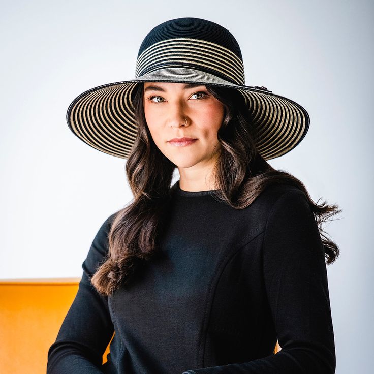 Stripes are always in style. From the beach to the runway, this hat adds a touch of class to any event. Flexi-Weavefabric keeps it looking great. For a petite version of the Marseille, click here. UPF 50+ fabric blocks 97.5% of ultraviolet rays, according to the Australian Radiation Protection Agency 4½" brim Packable: Stuff it Crown size: M (58cm) Inner drawstring adjusts fit 100% polyester exclusive of trim Spot clean only Wallaroo hats do not feature a built-in magnet for emblems. For hats wi Wallaroo Hats, Fabric Blocks, Long Sleeve Swimwear, Radiation Protection, Wide Brim Sun Hat, Fancy Hats, Ultraviolet Rays, Touch Of Class, Wide Brimmed Hats