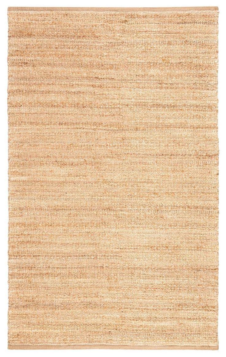 an area rug made out of jute, with no one on it or the floor