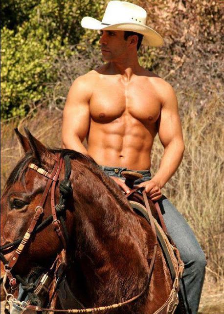 a shirtless man riding on the back of a horse