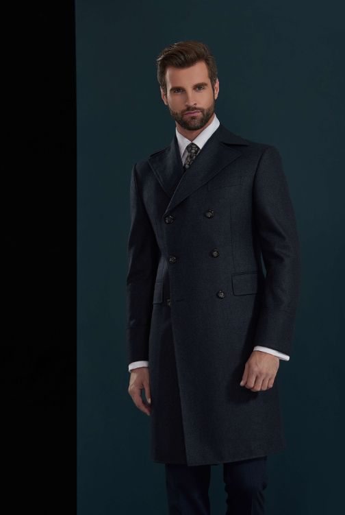 This classic black, double breasted winter coat for men or women was designed for both comfort and style. This coat is perfect for business, formal wear, and parties. FREE SHIPPING ON ORDERS OVER $199 COLOR Dark Navy COMPOSITION 100% WOOL YARN COUNT SUPER 100s WEIGHT 480g FABRIC STYLE Solid OCCASION Wedding/Gala Luxury Semi-formal Pea Coat With Double Button Closure, Black Wool Double Breasted Suit, Timeless Double-breasted Formal Sport Coat, Black Wool Double-breasted Suit, Wool Tuxedo Outerwear With Double Button Closure, Luxury Notch Lapel Peacoat With Double-breasted Buttons, Luxury Double-breasted Pea Coat For Tailoring, Luxury Double-breasted Business Blazer, Luxury Business Peacoat With Double Button Closure