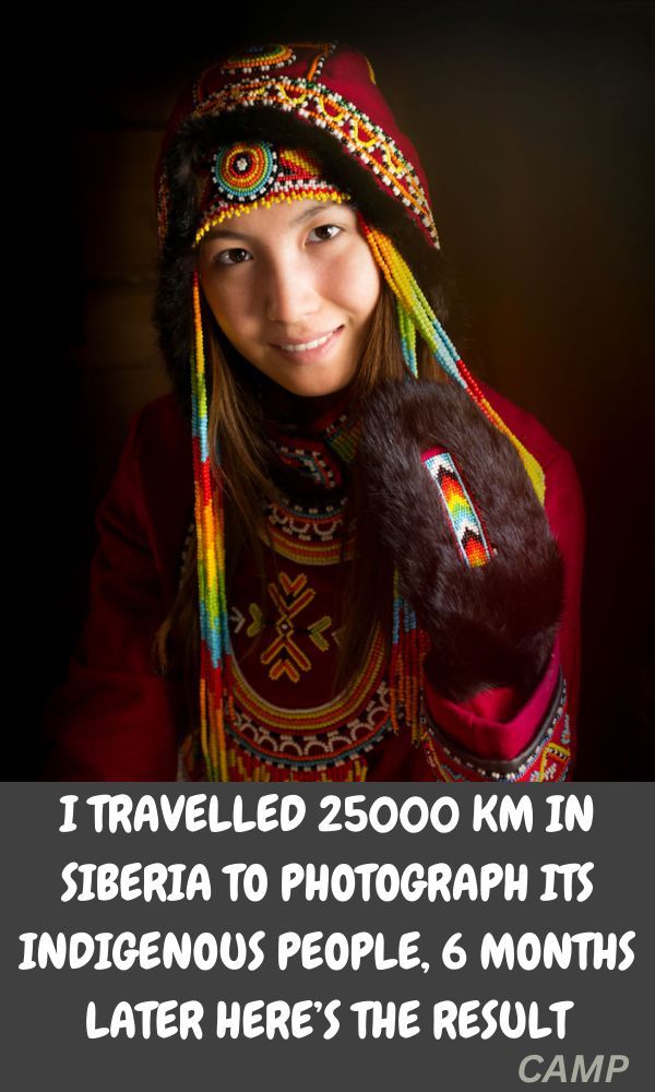 a woman with long hair wearing a colorful headdress