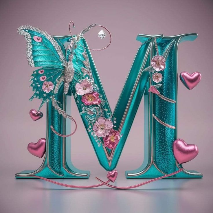 the letter m is decorated with butterflies and flowers