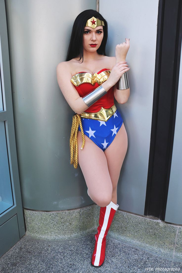 a woman in a wonder costume posing for the camera