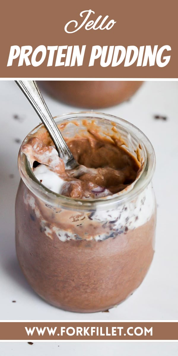 a jar filled with chocolate pudding sitting on top of a table