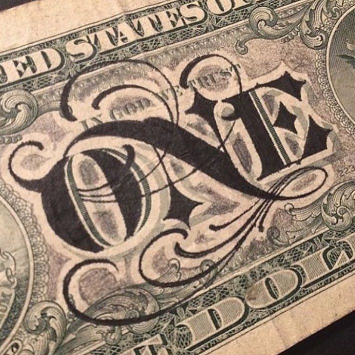 an old one dollar bill with the letter d on it