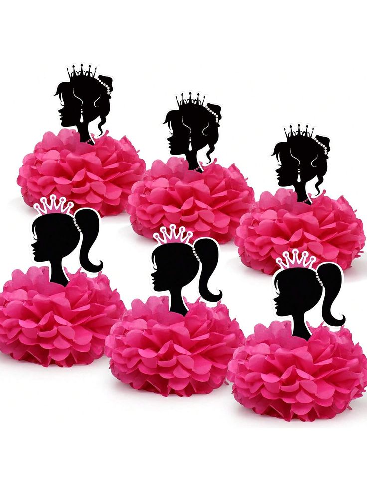 six pink pom poms with black silhouettes and crowns on them, sitting in front of a white background