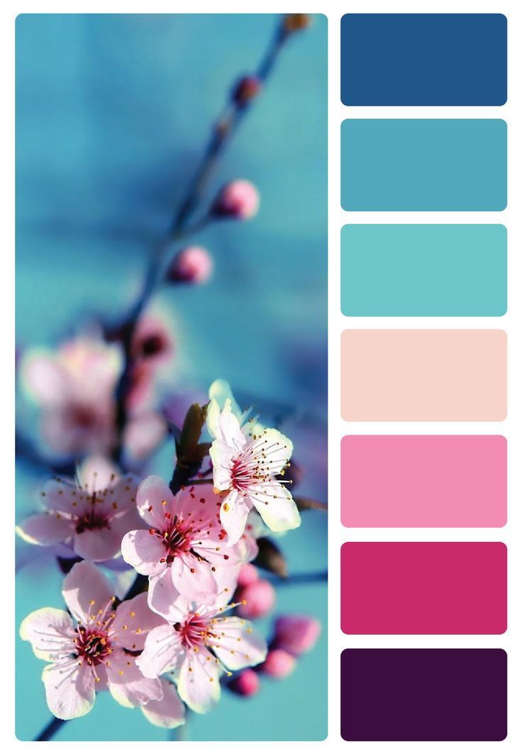 the color scheme is blue, pink and green with white flowers on it's branches