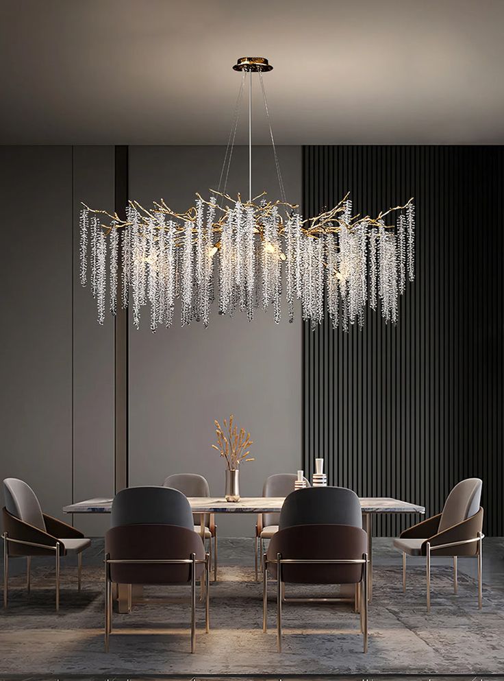 a dining room with a chandelier hanging from the ceiling and chairs around it