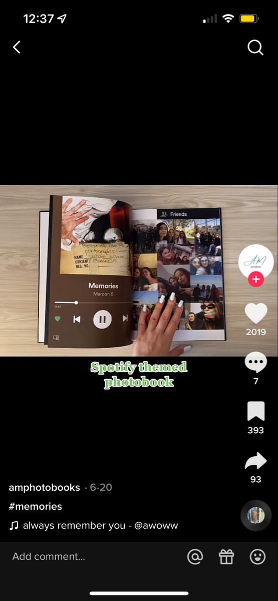 an open book sitting on top of a wooden table