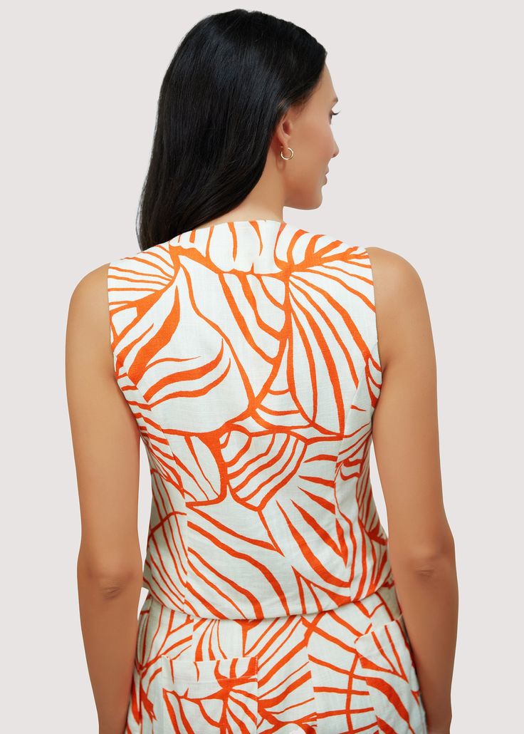 Introducing our Salt To The Sea Vest Top - a fun, feminine addition to your summer wardrobe. Made with a breathable cotton blend fabric, this abstract palm print top will keep you cool and stylish all season long. Perfect for hot days and chic nights. WTWH02858 Imported Lined Self: 70% Cotton 30% Linen Lining: 100% Rayon Model is 5 ft 9.5 inches; Bust: 32", Waist: 24", Hips: 34" and wearing a size Small Runs true to size Hand wash or wash with gentle cycle with cold water with like colors, Air d Tropical V-neck Top For Summer, Beachwear V-neck Tops With Tropical Print, Cotton V-neck Beachwear Tops, Trendy Beach Top With Bold Print, Trendy Beach Tops With Bold Print, V-neck Beach Top With Abstract Print, Trendy Tops With Bold Print For Beach, Trendy Tops With Bold Print For The Beach, Chic Beach Tops With Abstract Print