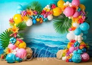 an arch decorated with balloons and flowers on the beach