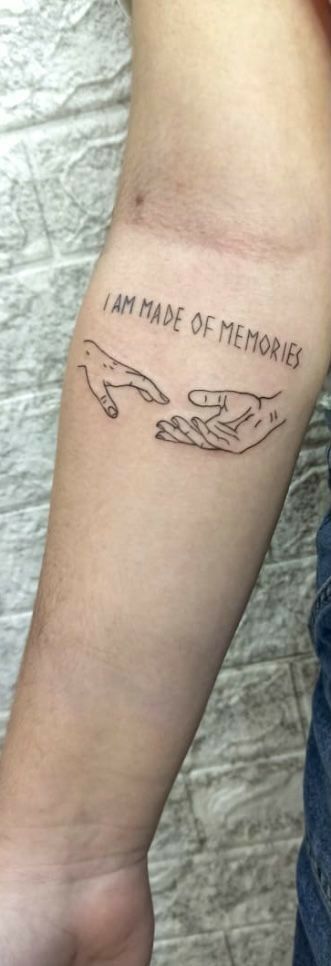 someone has a tattoo on their arm that says i am made of memories