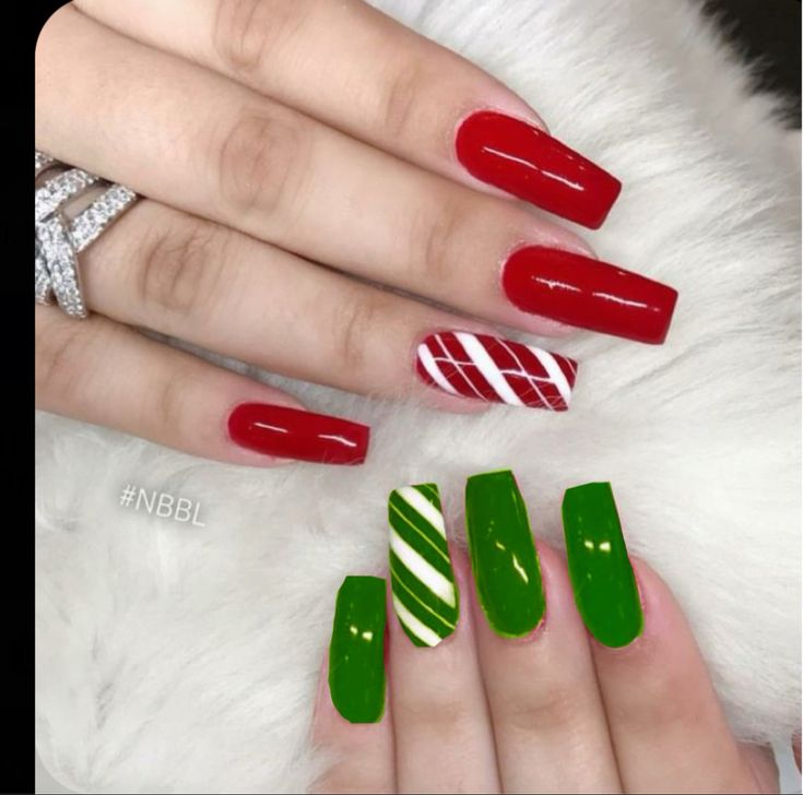 Red White And Green Acrylic Nails, Green And Red Candy Cane Nails, Green And Red Nails Ideas, Red And Green Christmas Nails Coffin, One Hand Red One Hand Green Nails, Red And Green Candy Cane Nails, Green Red And White Nails, Red And Green Christmas Nails Acrylic, Red And Green Christmas Nails Simple