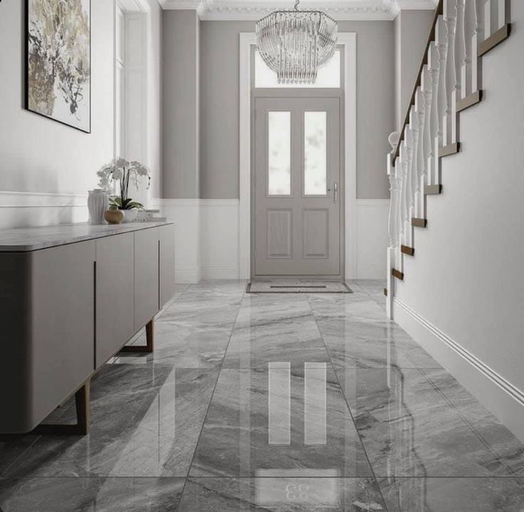 a hallway with marble floors and white walls