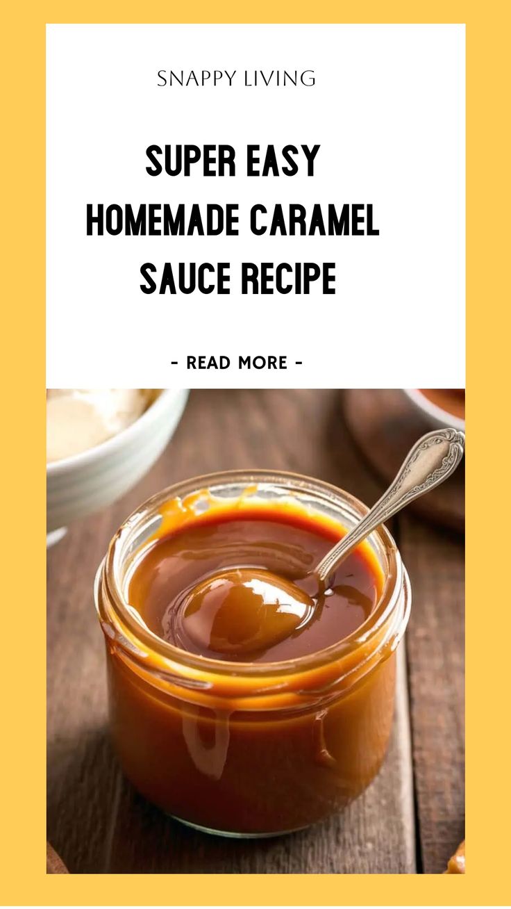 a jar filled with homemade caramel sauce on top of a wooden table next to a spoon