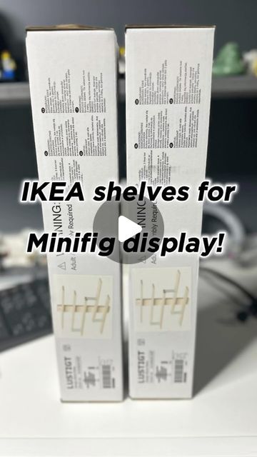 two empty boxes sitting next to each other on top of a white table with the words ikea shelves for minifig display