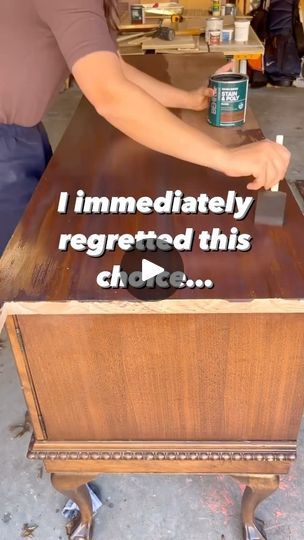 a man is painting the side of a table with words on it that read, i immediately regred this chair