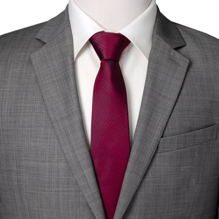 Designed with a perfect balance of simplicity and quality, this burgundy tie features a traditional black pin dot pattern. A fashion forward design for classic and modern gentleman alike. Our tie will maintain its shape and hold a perfect knot thanks to the durable yet soft 100% Silk. A versatile tie that can be added to any outfit and worn for both casual and formal occasions. Semi-formal Fitted Burgundy Suit And Tie Accessories, Dapper Solid Color Ties For Business, Burgundy Standard Tie For Business, Classic Burgundy Ties For Business, Burgundy Semi-formal Suit And Tie Accessories, Burgundy Business Tie, Classic Burgundy Suit And Tie Accessories For Business, Classic Burgundy Suit And Tie Accessories For Formal Occasions, Elegant Burgundy Suit And Tie Accessories For Business