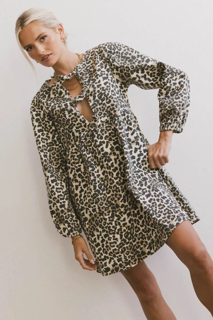 Tyler Peplum Mini Dress in Leopard Casual Leopard Print Mini Dress, Long Sleeve Leopard Print Mini Dress For Fall, Long Sleeve Leopard Print Mini Dress For Summer, Denim Jumpsuit Overalls, Chic Long Sleeve Leopard Print Mini Dress, Layered Sweater, Maxi Outfits, Leopard Print Stretch V-neck Dress, Peplum Styles