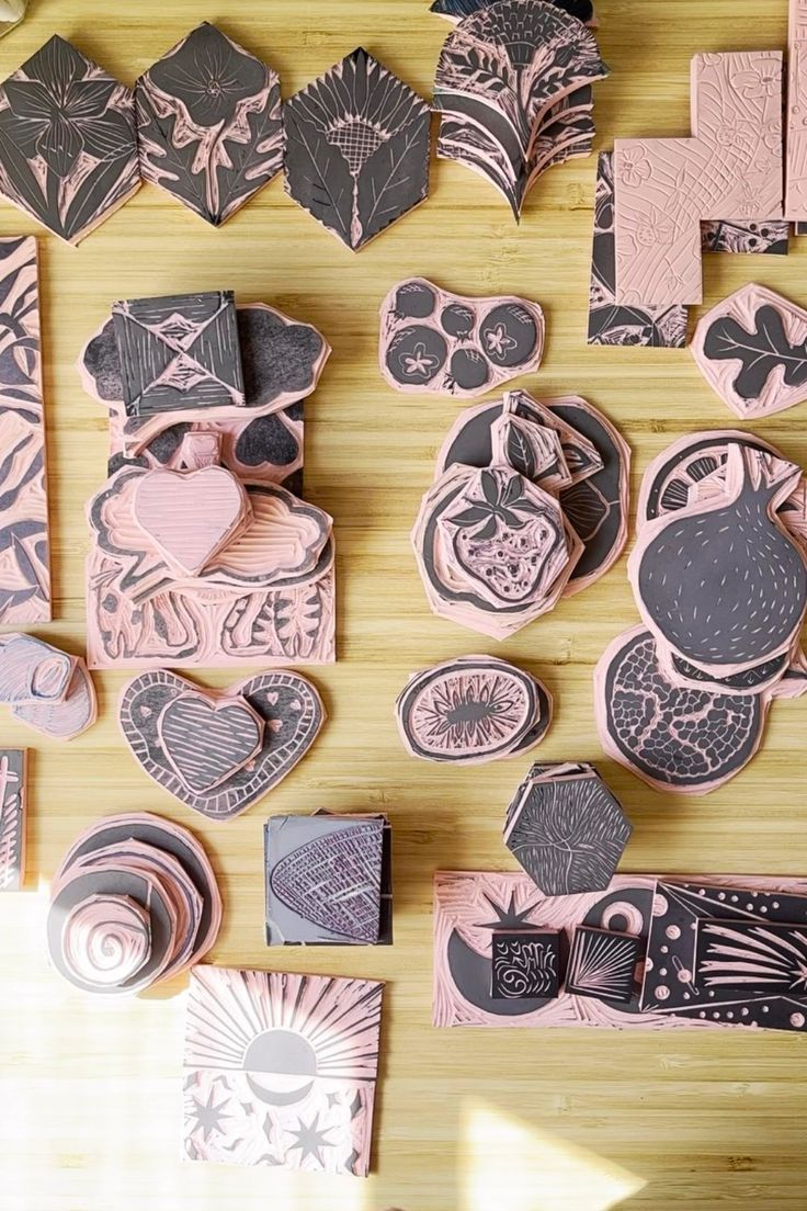 several different shapes and sizes of stamps on a table