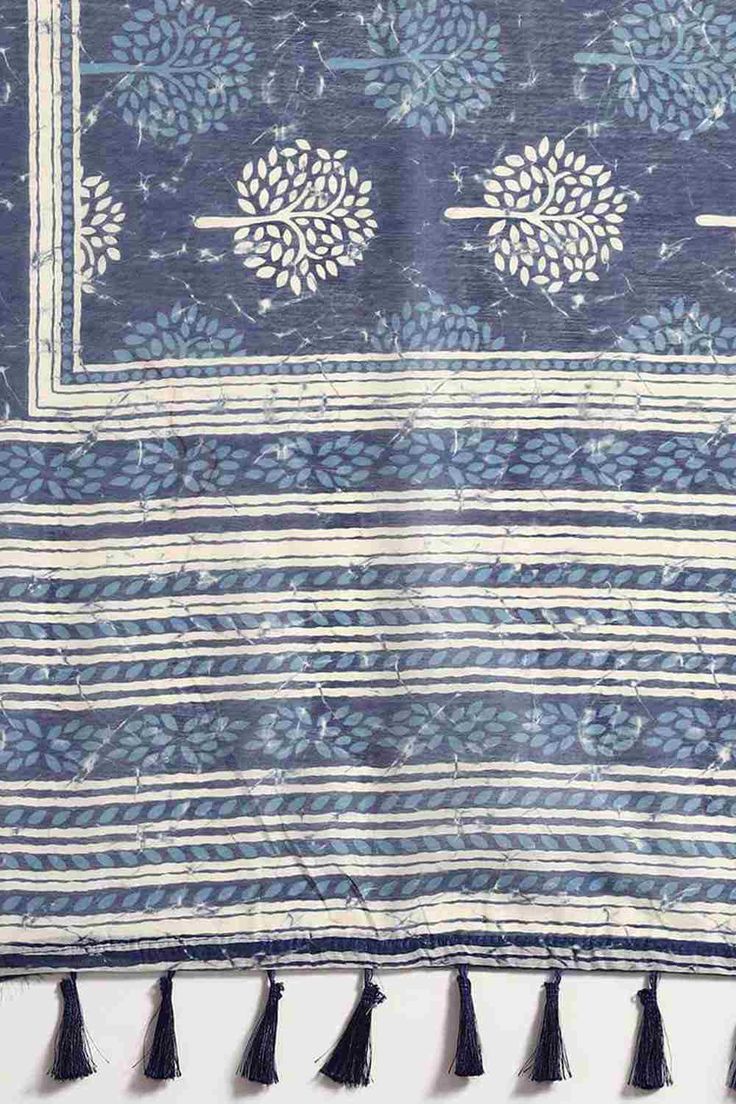 Product Features: Saree: Saree as seen in picture - Choose the drape style while order: Standard, Pleated or Gujarati Saree Color: Blue::White Saree Fabric: Cotton Saree Style: Handloom Saree Saree Work: Block Print Saree Pattern: Digital Printed Saree Print: Block Print Blouse: Blouse design must be chosen while ordering. For the blouse in pic, please choose the selection "As seen in picture" or customize your selection. Blouse Color: Blue::White Blouse Fabric: Cotton Wash Care: Dry Clean Only Indigo Block Print Dupatta For Diwali, Blue Cotton Dupatta With Batik Print, Blue Chanderi Dupatta With Printed Border, Blue Dupatta With Printed Border For Diwali, Blue Chanderi Dupatta With Block Print, Traditional Blue Saree With Batik Print, Traditional Blue Batik Print Saree, Festival Blue Block Print Saree, Festive Blue Batik Print Saree