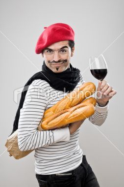 a woman holding a glass of wine and bread in her hands with the caption you're in my country speak french with me i'm in your country, speak