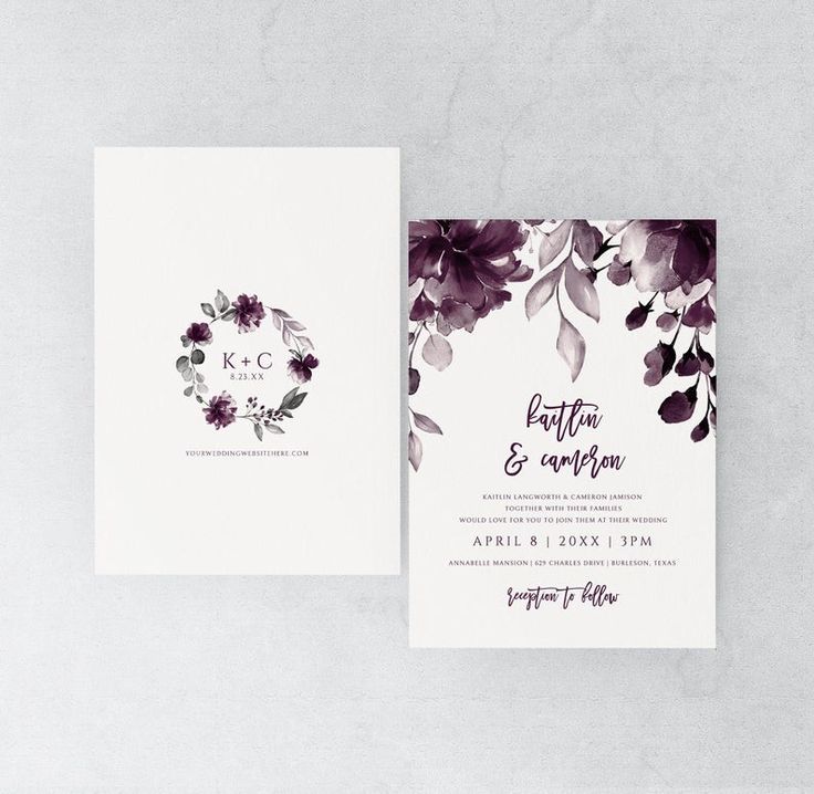 two wedding cards with purple flowers and greenery on the front, one in white