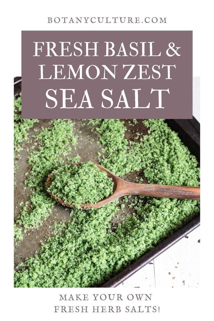 fresh basil and lemon zest sea salt on a baking sheet with a wooden spoon