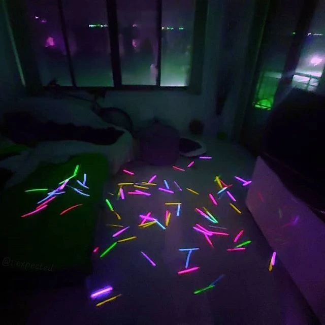 the room is lit up with colorful lights