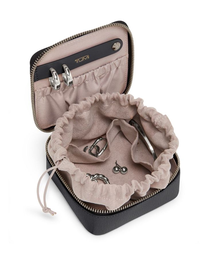 This luxe leather jewelry case is designed to organize earrings, necklaces and rings when traveling or on-the-go. With the option of complimentary monogramming, it makes the perfect gift. Organize Earrings, Necklaces And Rings, Earring Hole, Best Stocking Stuffers, Earring Organizer, Travel Jewelry, Jewelry Case, Men's Backpack, Everyday Bag