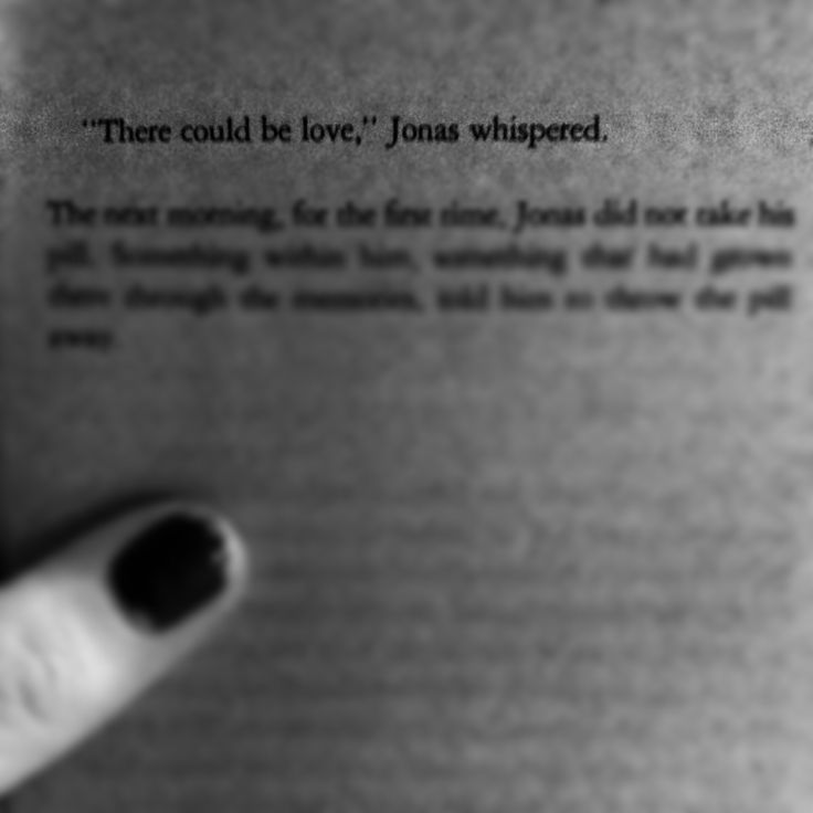 a person holding up a book with the words there could be love, jonas whispered